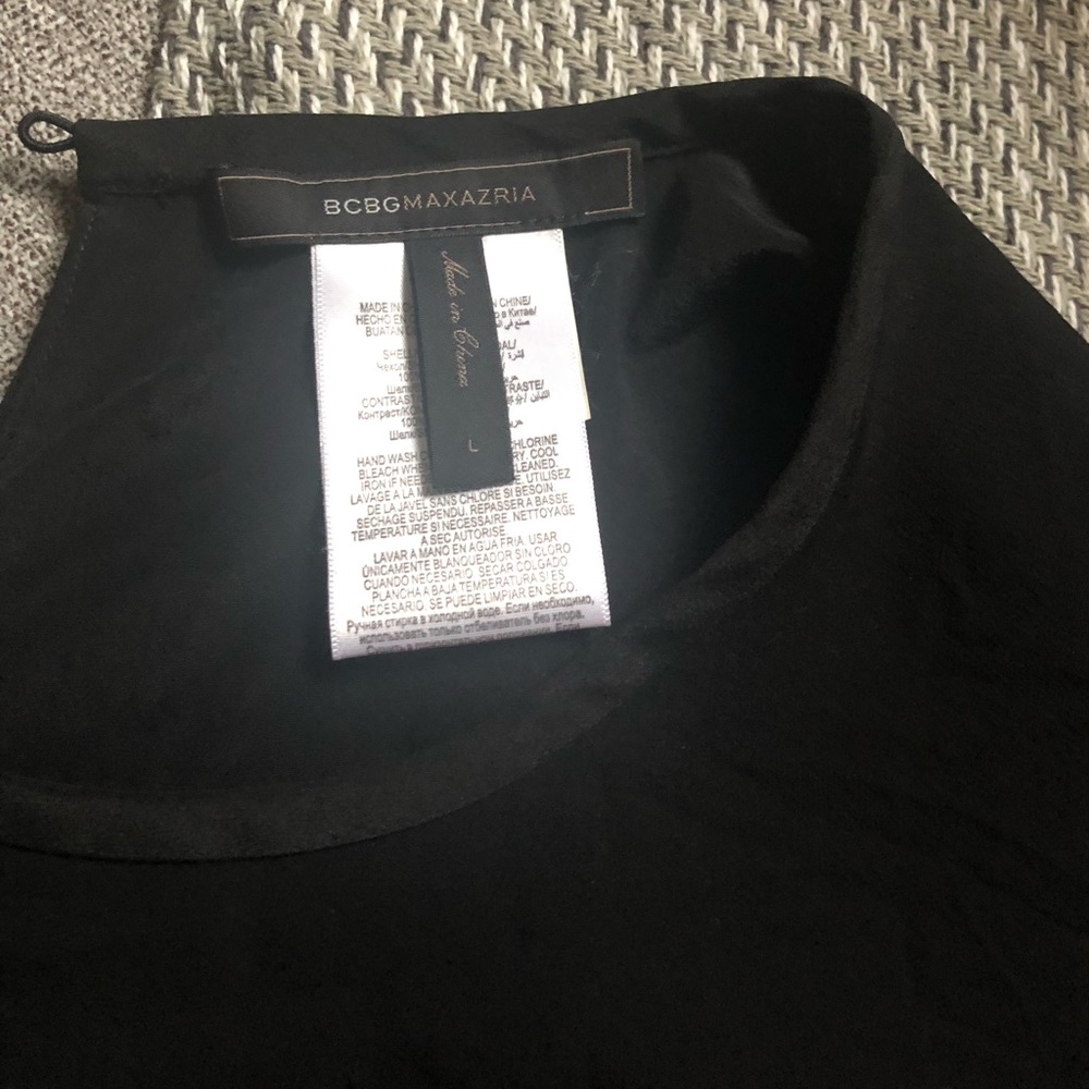 BCBG MaxAzria silk top with split back hem size L